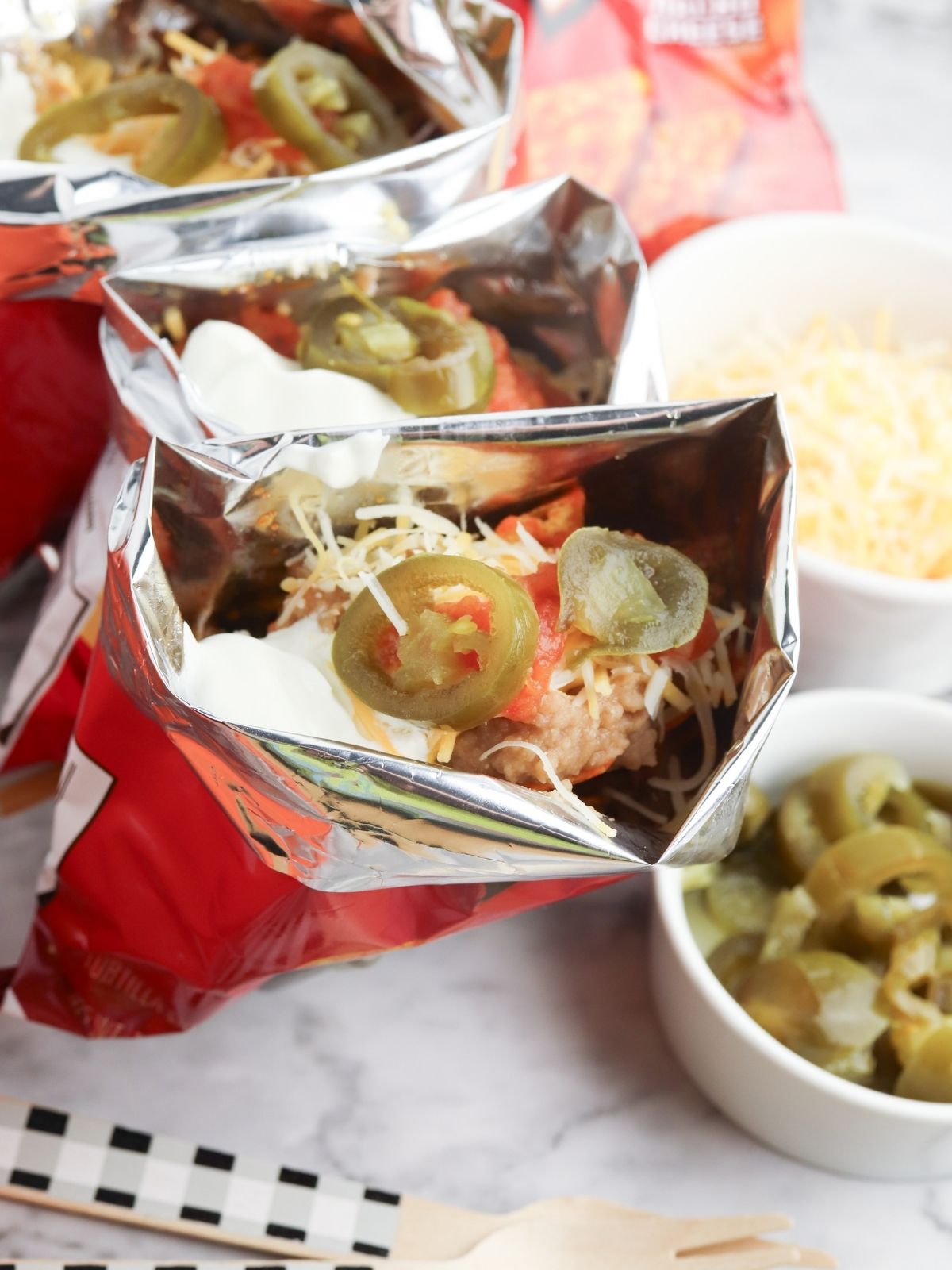 Close up of nachos in a bag.
