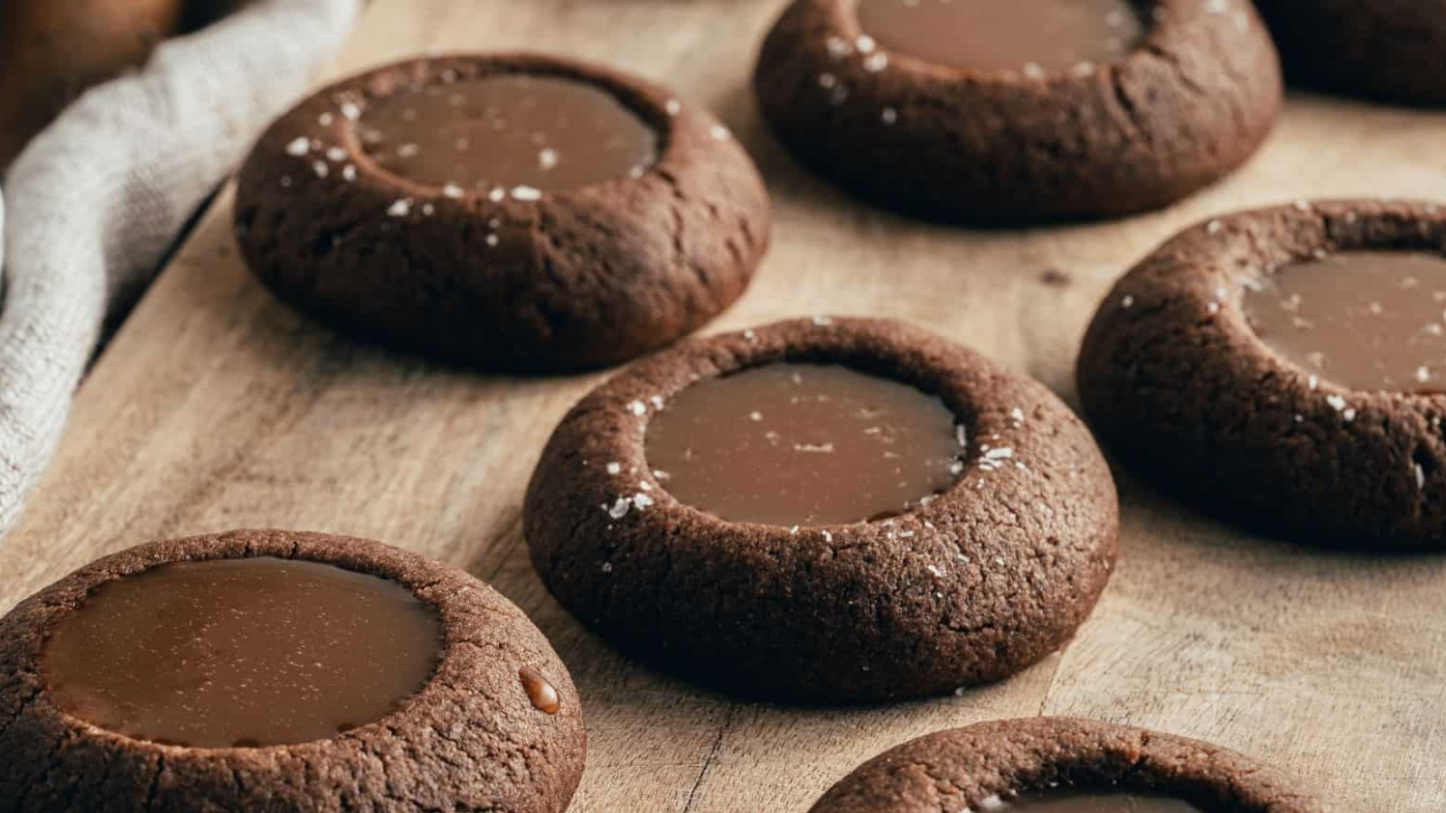 Overhead image of caramel chocolate thumbprint cookies.