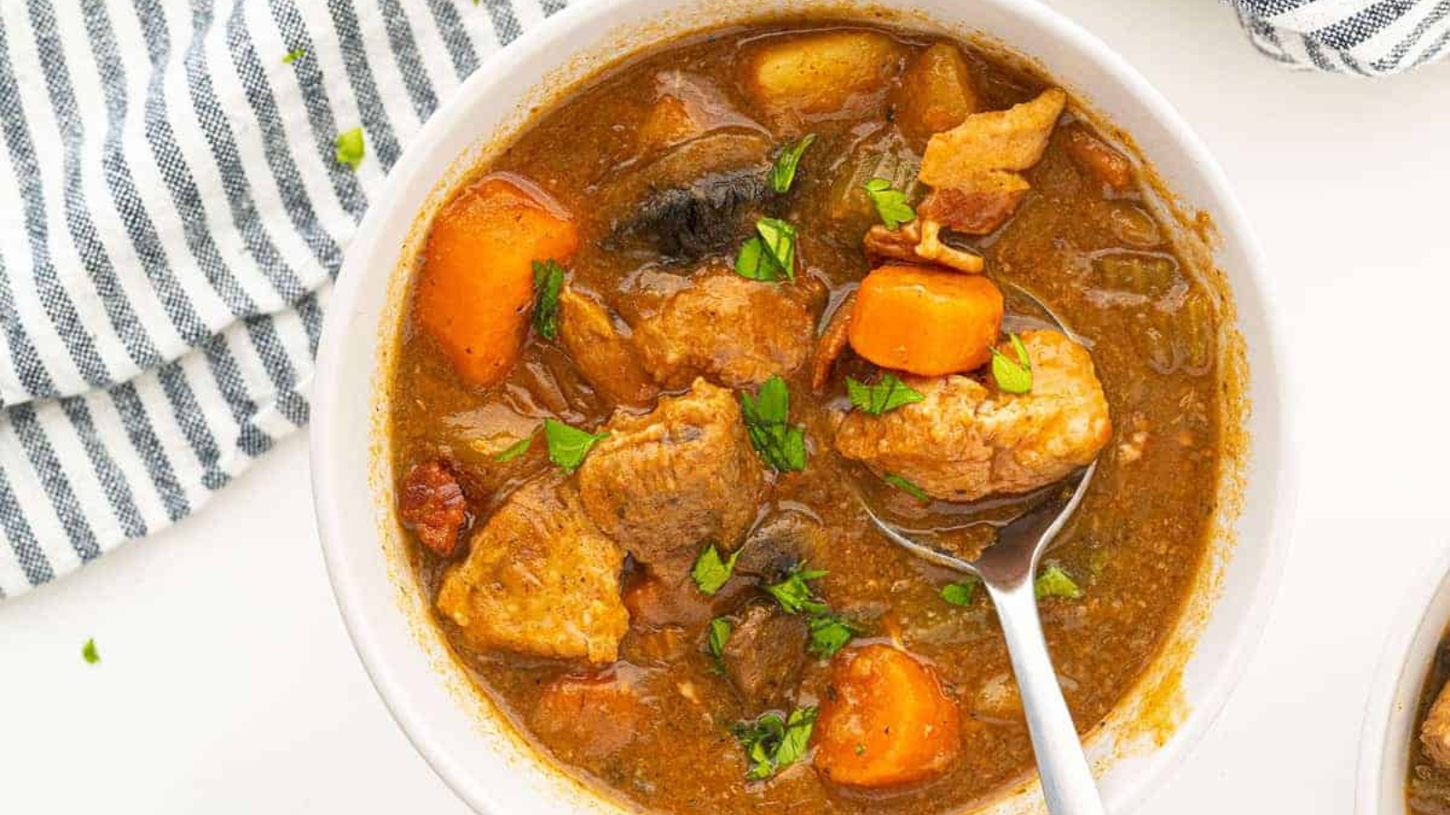 Classic homestyle pork stew in a bowl.