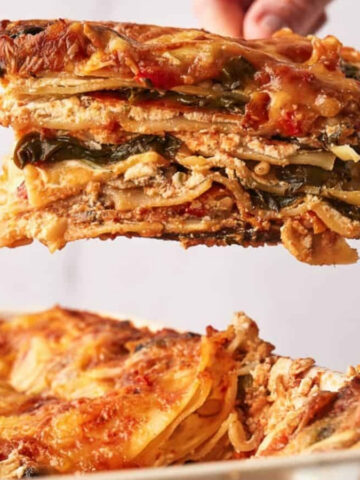 A lasagna being dished up.