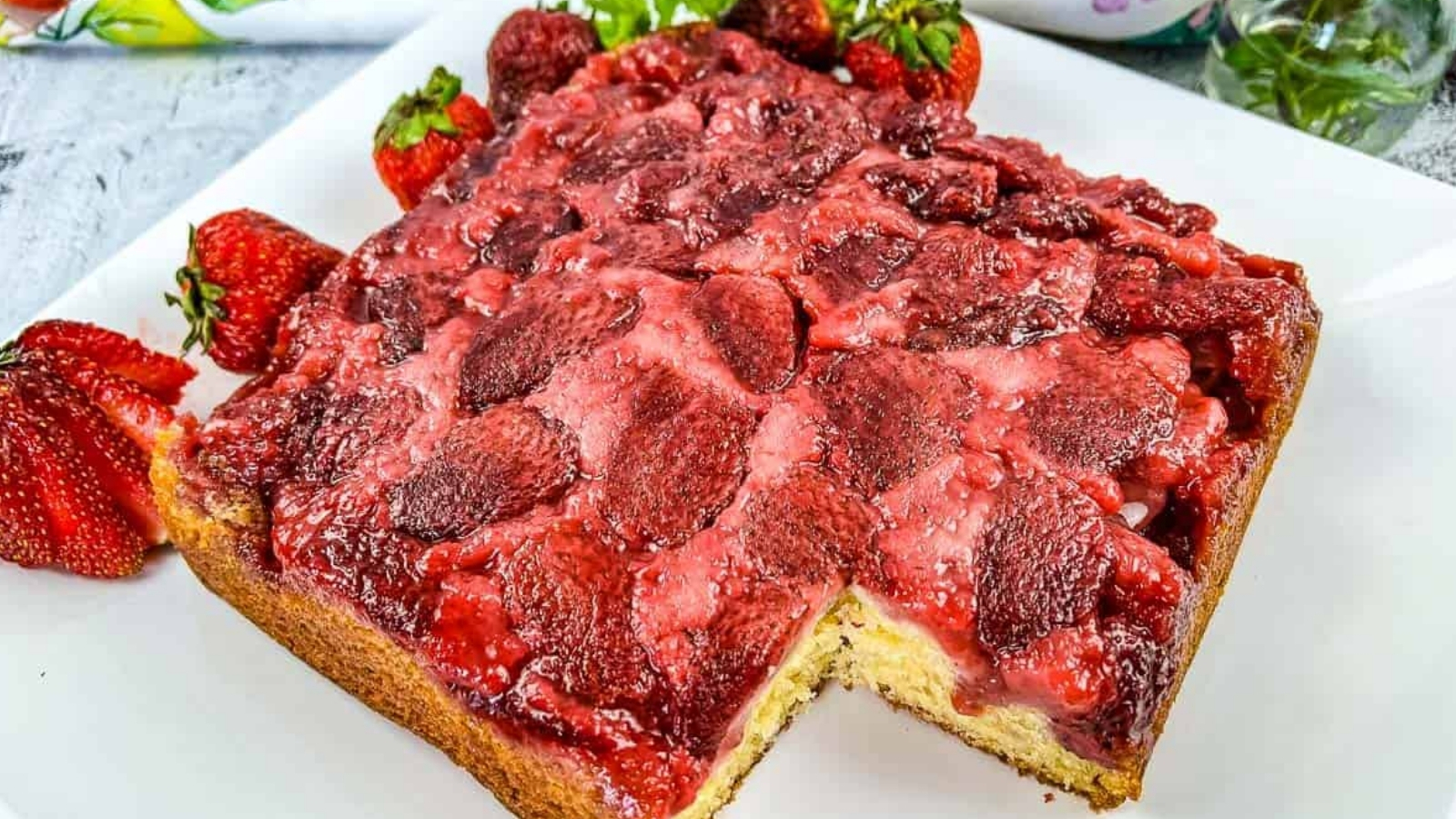 Strawberry Upside Down Cake with a slice missing.
