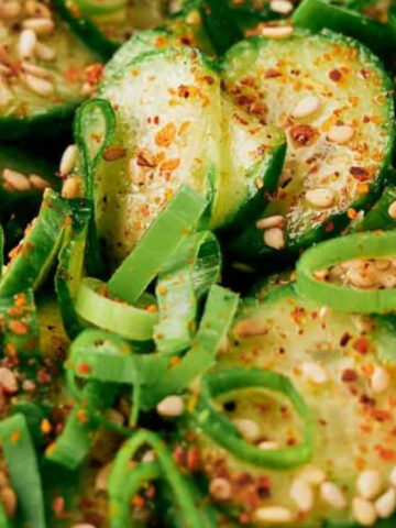 Slices of cucumber tossed in spicy Korean dressing.