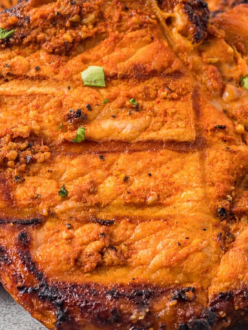 Close up photo of grilled boneless pork chops.