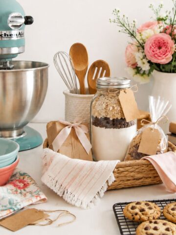 Kitchen gift ideas for Mother’s Day featuring baking supplies, mixer, and homemade treats.