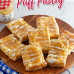 Easy Lemon Curd Cream Cheese Puff Pastry made with flaky puff pastry, creamy cheesecake filling, tangy lemon curd, and a sweet icing drizzle.