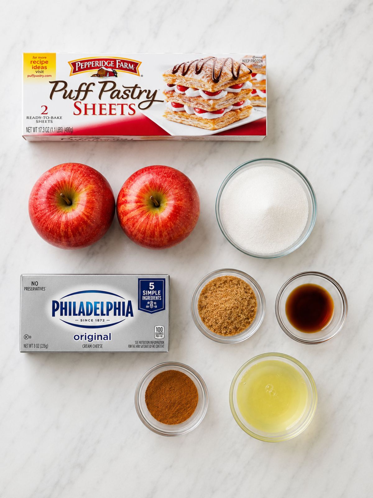 assorted ingredients needed to make the homemade puff pastry braid with apples.