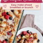 breakfast casserole with berries and sweetened glaze in casserole dish and served on white plate with text overlay.