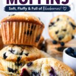 photo of stacked blueberry muffins with one cut open muffin showing the inside with text overlay for a pinterest photo.